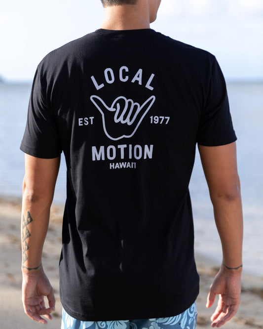 A man viewed from behind wearing a black t-shirt with a white graphic print [black]