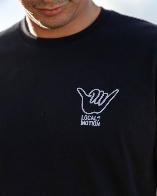 A close-up of a person wearing a black crewneck t-shirt [black]