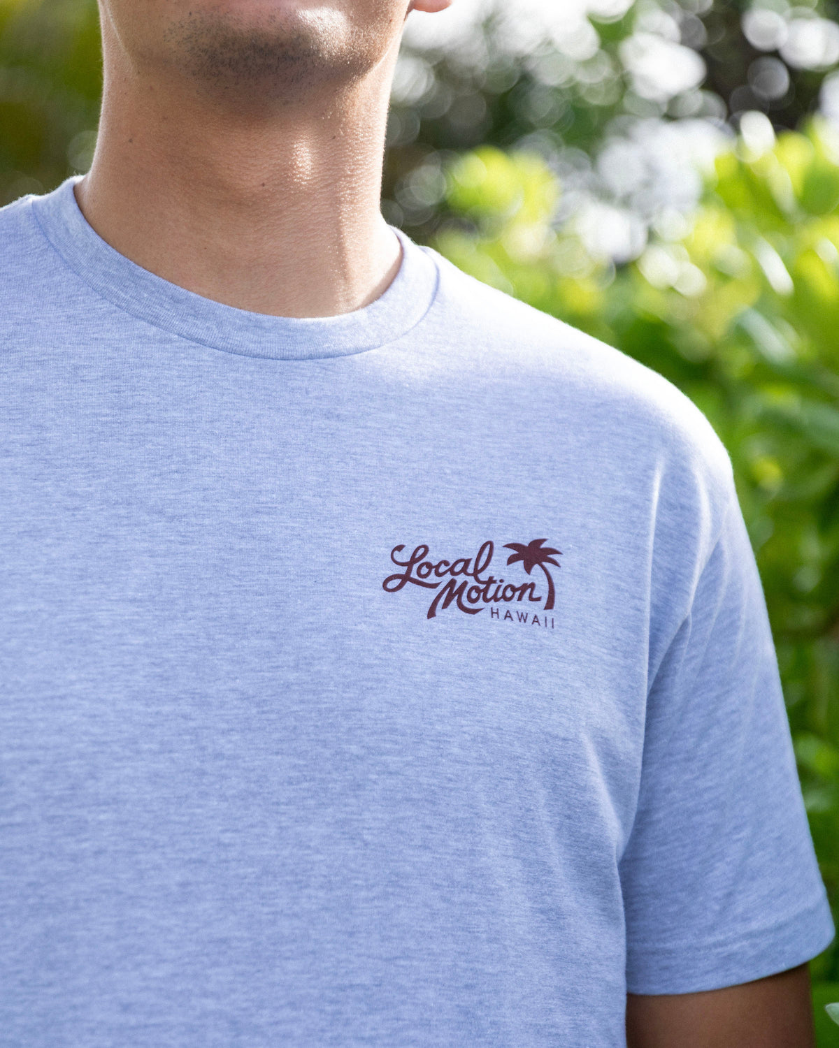 A heather grey shirt with Local Motion logo on chest [heather grey]