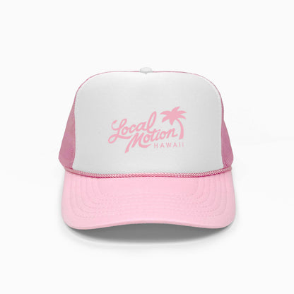Pink and white cap with 'Local Motion Hawaii' text on a white background