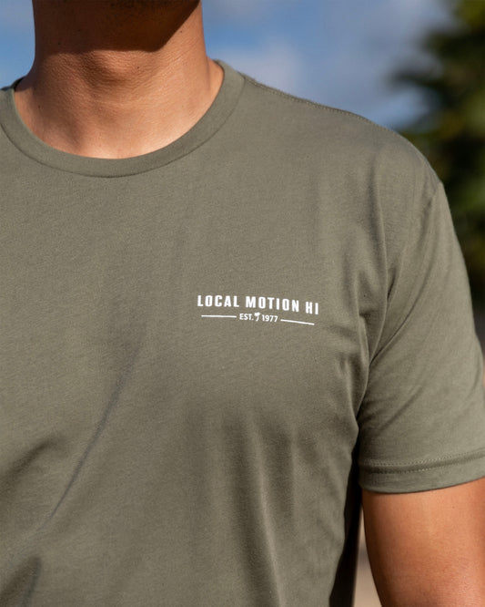 Close-up of a person wearing an olive green crewneck t-shirt [military]