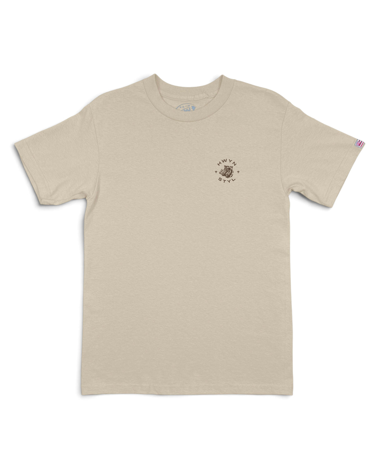 A light beige crewneck t-shirt with a small circular graphic on the left chest [sand]