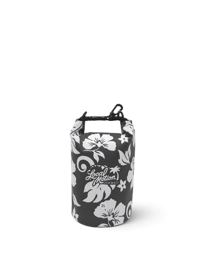 A dry bag with a black and white floral pattern, featuring the 'Local Motion' brand logo on the front, set against a plain white background. [black/cool grey]