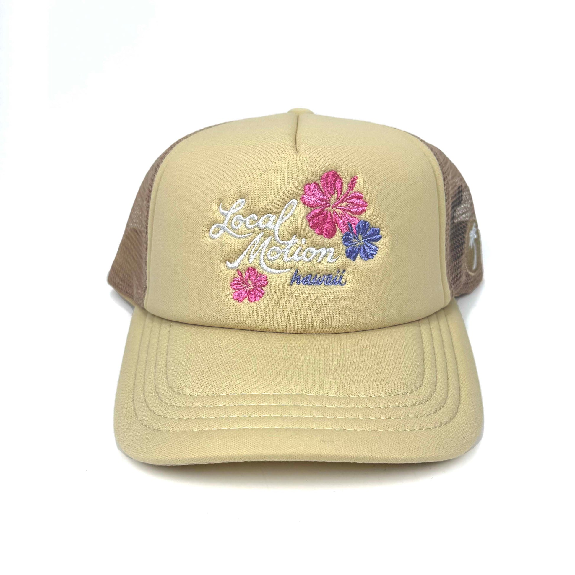 Beige trucker hat with floral designs and 'Local Motion Hawaii' text in white