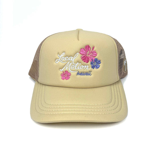 Beige trucker hat with floral designs and 'Local Motion Hawaii' text in white